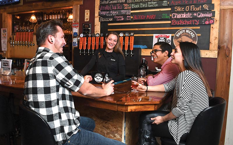 Bar patrons enjoying drinks
